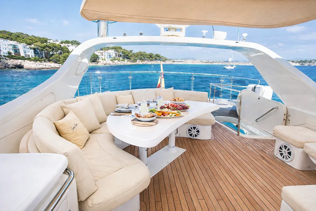Aft deck dining table set for lunch aboard Lady Elbaum, Astondoa 72