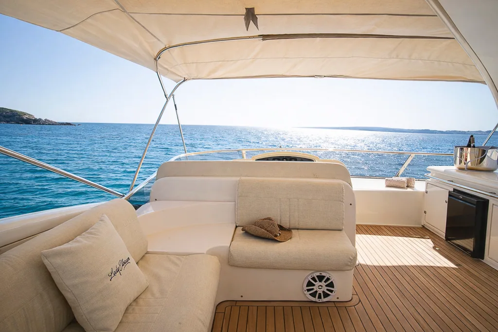 Aft lounge of Lady Elbaum at golden hour, Mediterranean view