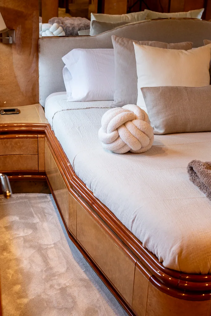 Cabin detail with knot accent pillow aboard Lady Elbaum