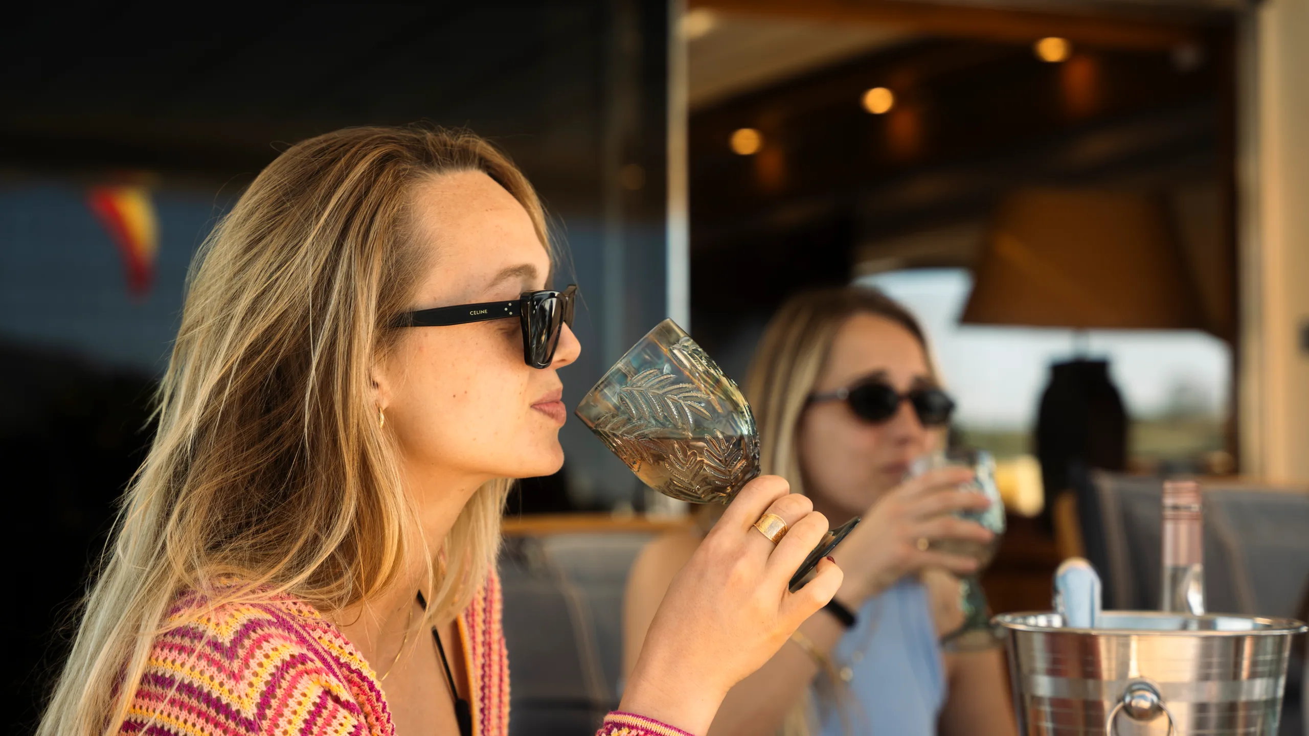 A drink at golden hour aboard Lady Elbaum, Mallorca yacht charter