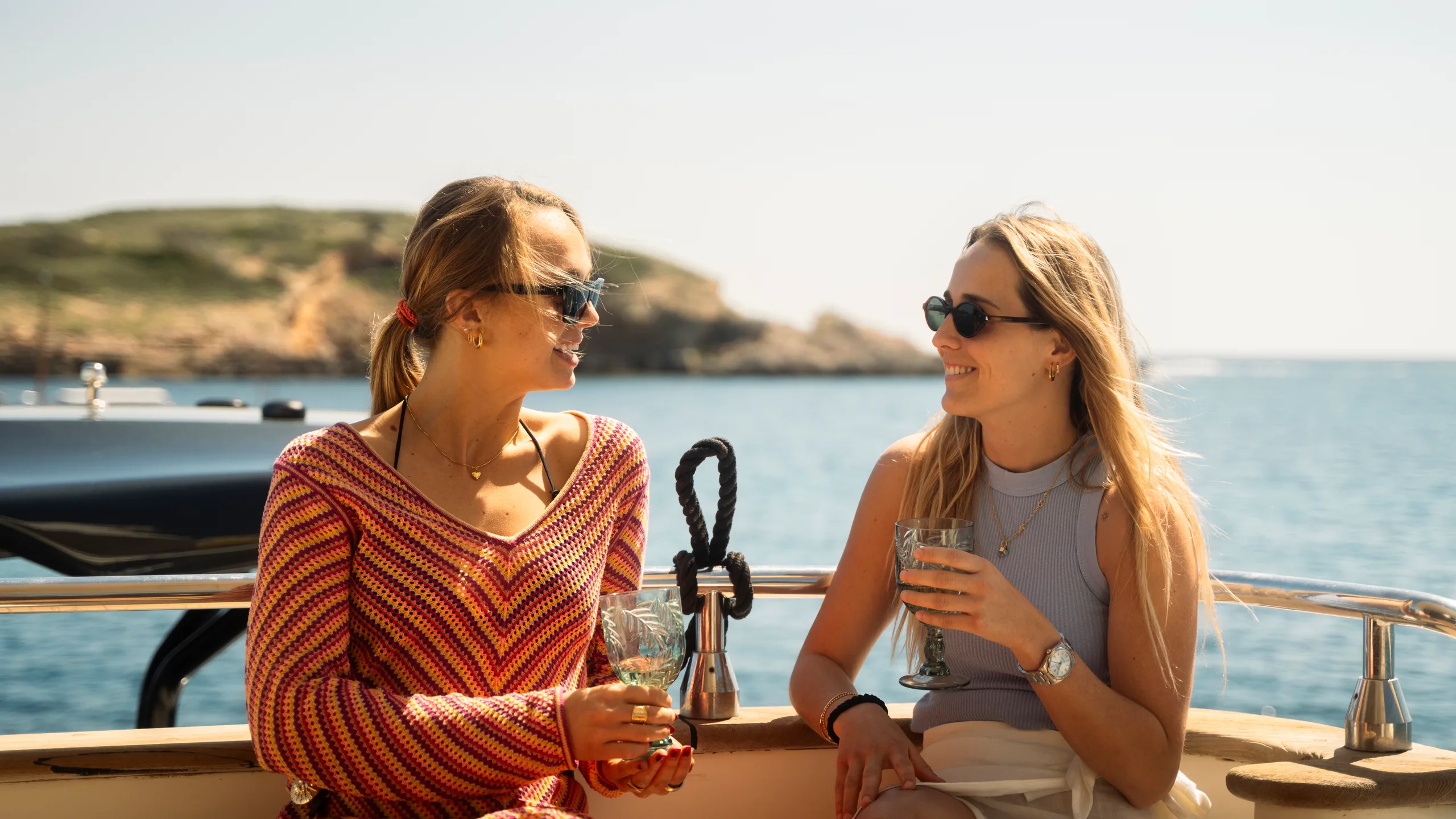 Guests at ease at anchor on Lady Elbaum in a Mallorca cove
